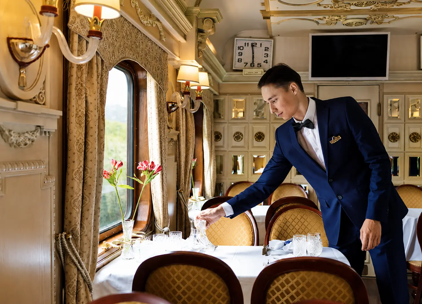 Dedicated luxury travel advisor assisting high-net-worth travellers with a bespoke international rail itinerary.