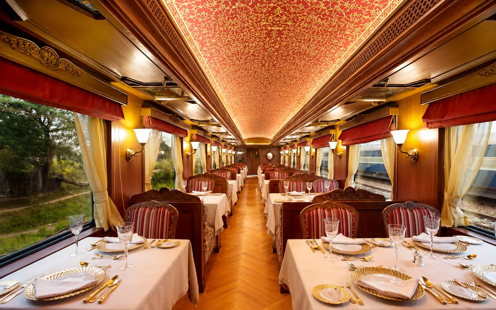 Luxury travellers boarding the Maharajas' Express with personalised concierge assistance and luggage handling.